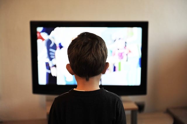 www.myiplayer.com and www.filmon.com are okay for streaming live British TV channels. The quality isn't great and there are a lot of pop-ups to deal with, but the sites are free to use.