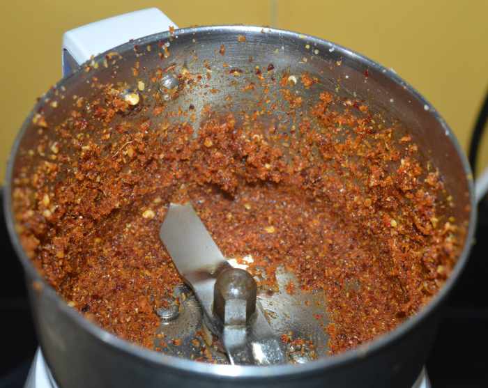 Grind to get a coarse paste. Transfer the paste to a large mixing bowl.