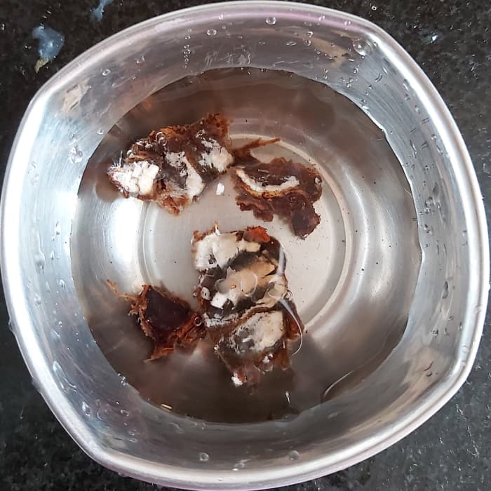 In a bowl, add 1 to 2 teaspoons of tamarind pulp, add water and soak for 10 to 15 minutes (skip this step if you are using store-bought tamarind paste).
