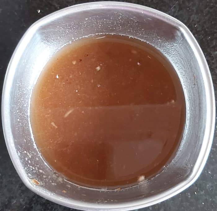 After the pulp has softened, squeeze the pulp into the water in which it is soaking and discard the fiber (filter it if there are any impurities). Set aside.