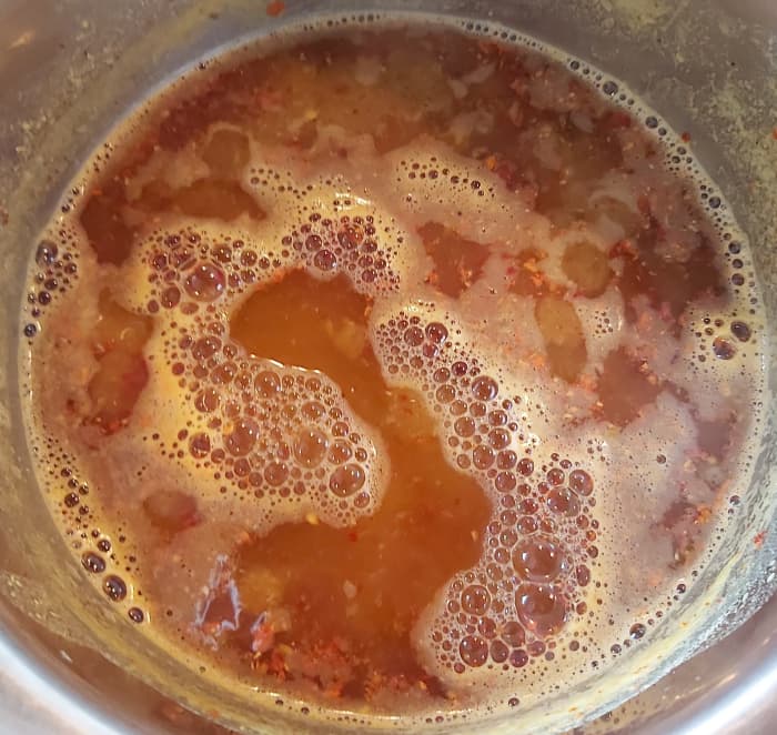 Adjust the salt and add water if required. Bring back to the boil and cook over medium heat for 5 minutes or until the spices have blended well. Switch off the heat.