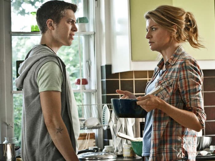 Rita in the kitchen withher son Ricco. Rita's style of mothering is fairly non-traditional, but her love for her children is obvious.
