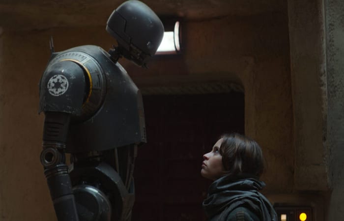 The banter between Jyn and K-2SO is much darker than one might suppose and symbolic of the film in general.