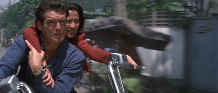 Yeoh (back) demonstrates that Bond girls needn't just be eye candy, getting involved and playing a vital part