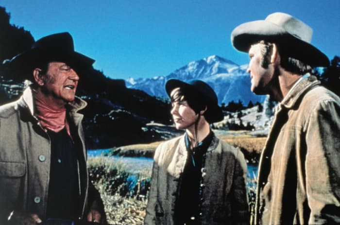 Darby (centre) plays a heroine that's rare from that era, a young woman who isn't afraid of getting stuck in with the men.