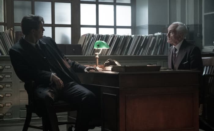 Max Irons and Terrence Stamp as Detective Charles Hayward and Chief Inspector Taverner in Crooked House (2017)