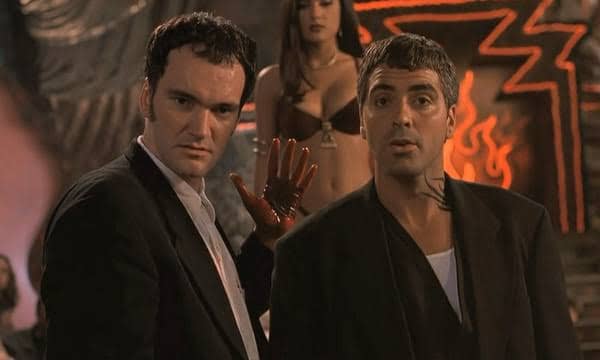 Tarantino (left) and Clonney (right) exemplify the movie's unhinged B-movie credentials, making the film feel as though something isn't quite right somehow.