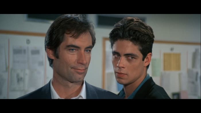 The film features Benicio Del Toro in an early role, looking impossibly fresh-faced as chief goon Dario