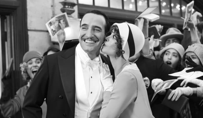 Dujardin (left) and Bejo (right) perfectly encapsulate the inherent glamour and style of pre-talkie movie stars and lend the film a startling credence.
