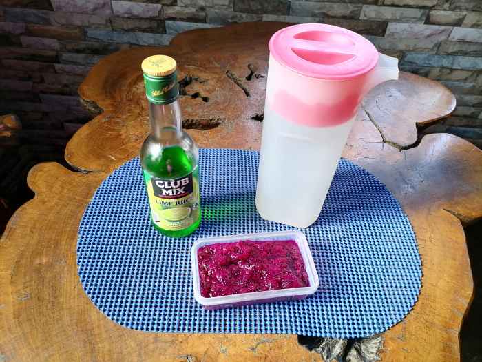 Ingredients for a dragon fruit and lime virgin cocktail