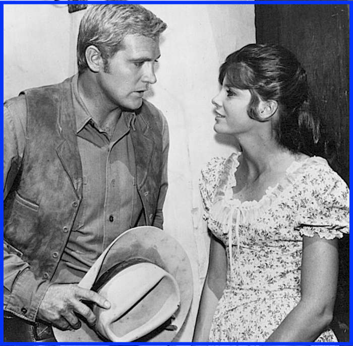 Robert Redford and Paul Newman weren't the first cowboys to fall under Katharine Ross' spell. Here she appears with Lee Majors in a guest appearance on the TV series Big Valley.
