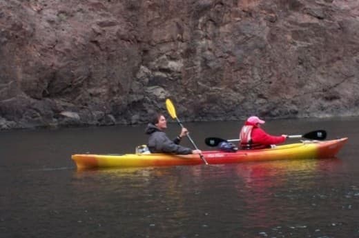 Be sure to wear your life jacket. It's the law! (What about that guy in the back, you ask? His life vest is under his jacket.)