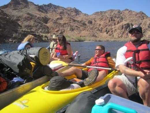 A canoe and kayak "barge" in Black Canyon—my friends and I lash our boats together for a lazy float from Arizona Hot Springs to Willow Beach.
