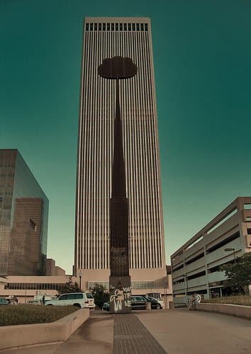 Downtown Tulsa Treasures: The Artificial Cloud is dwarfed by downtown Tulsa's tallest skyscraper, the BOK Tower. The Bank of Oklahoma Tower is a much smaller version of one of the twin towers of NYC's World Trade Center, and was actually designed by