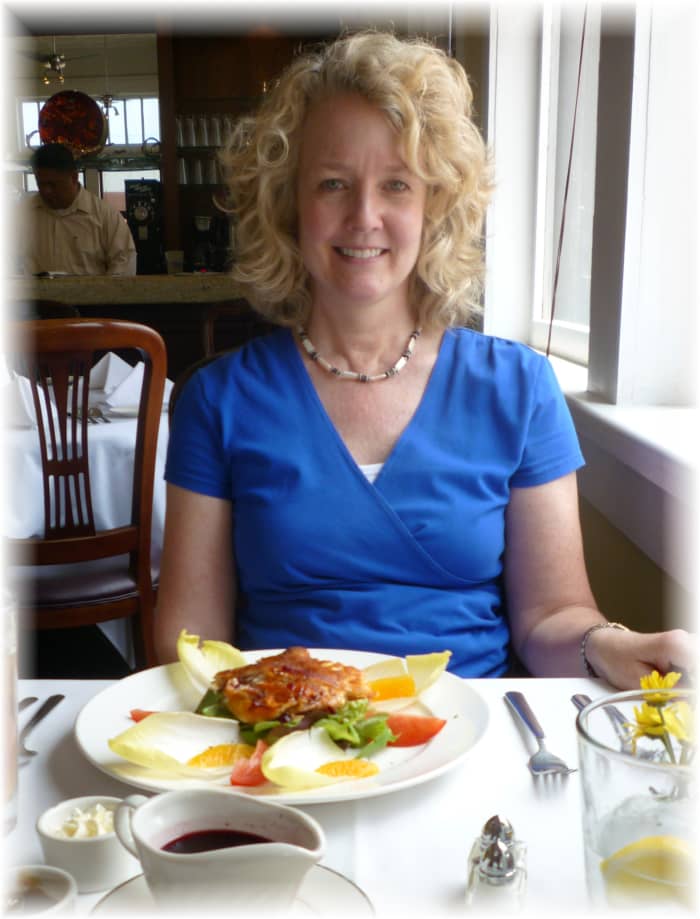 Lisa enjoying her salad with chicken and goat cheese inside Cocoamoda Restaurant in Calvert, Texas.