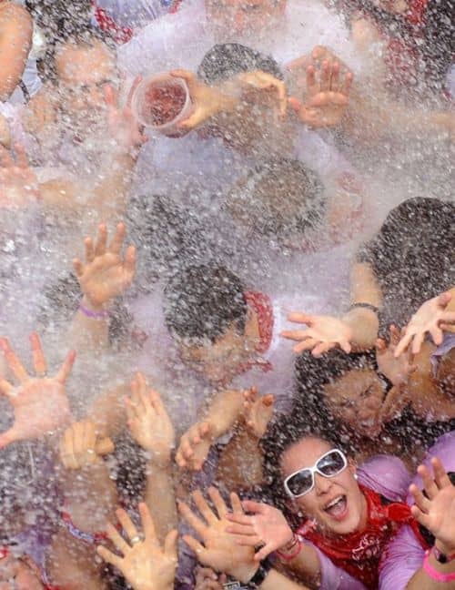 It is normal to have water and sangria dumped onto the crowds from balconies above the streets.