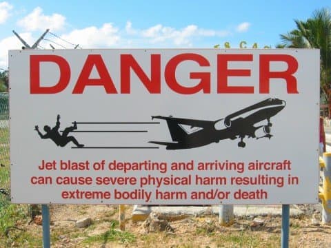 A sign posted at Princess Juliana International Airport warning tourists of jet blasts.