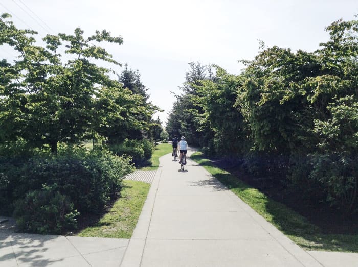 This is part of the Central Valley Greenway near the farmers market. The greenway has paths for both pedestrians and cyclists.