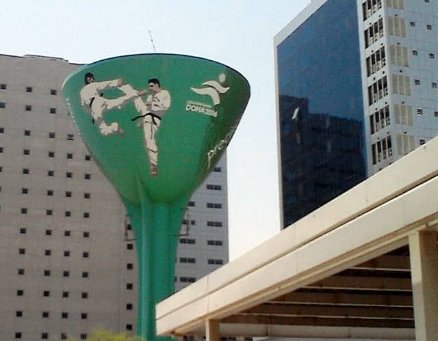 Water tower with karate kids - in the run-up to the doha asia games, 2006, the many water towers around town were painted with sporting themes to promote the games.