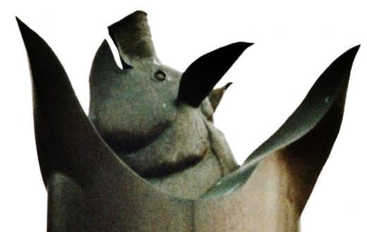 Closeup photo of the pig-topped sculpture by Iowa artist Tom Stancliffe.