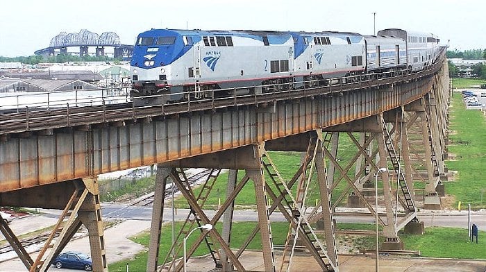 Westbound Sunset Limited slowly climbs down the long viaduct over the Mississippi River flood plain.