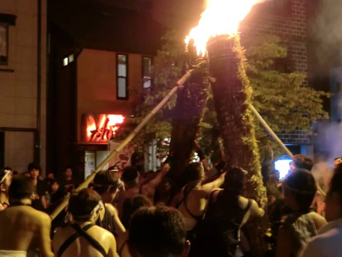 Let's get a closer look. Here, the first two torches are leaned up against each other.