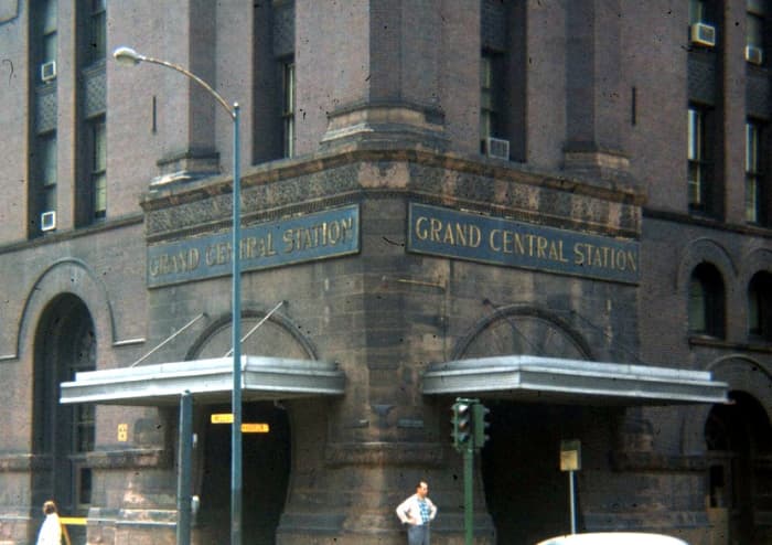 Main entrance of Grand Central Station beneath 247-foot clock tower at the corner of Harrison and Wells.