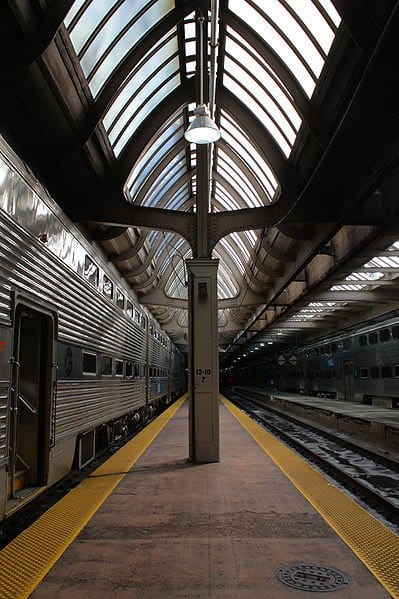 Numbers on the steel post column indicate the track numbers, Track 10 is on the right and Track 12 is on the left.