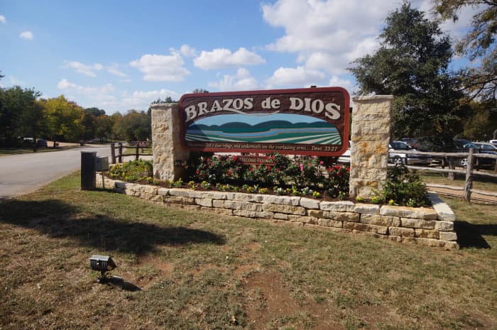 The entrance to the Homestead Heritage village, where a restaurant, craft store and workshops are all nearby. "Brazos de Dios" is Spanish for "the arms of God," a name given to the Waco area describing the rivers that meet here.