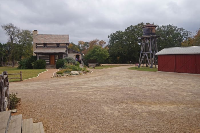 A model homestead that has its own water tower, a silo, two barns, a smokehouse and a garden with poultry pens. There is also a room to see a video about the community with this area.