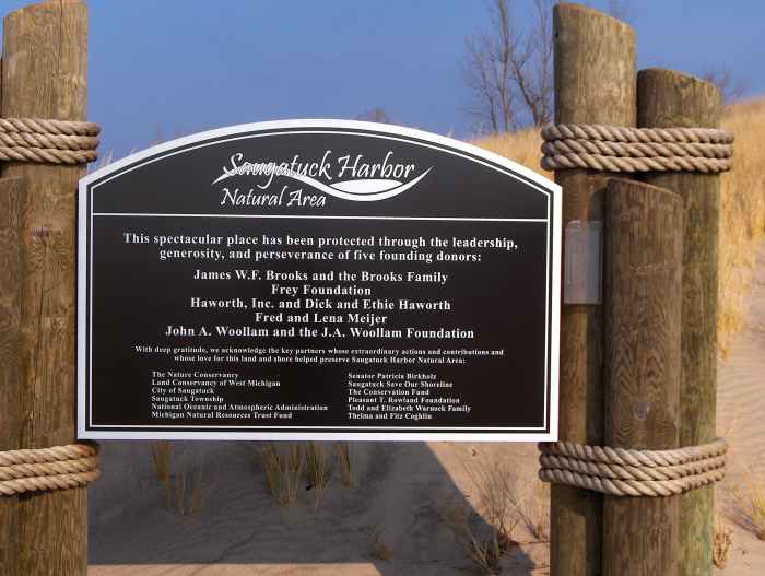 A proud dedication toward community efforts responsible for saving the pristine coastal dune landscape