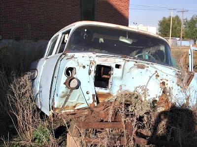 Melville, Saskatchewan, has the most amazing old car graveyard. We took photo after photo of junky old cars until the train whistle sounded about 20 minutes later. One couple was left behind. They had to catch up to the train in a taxi. Don't do that