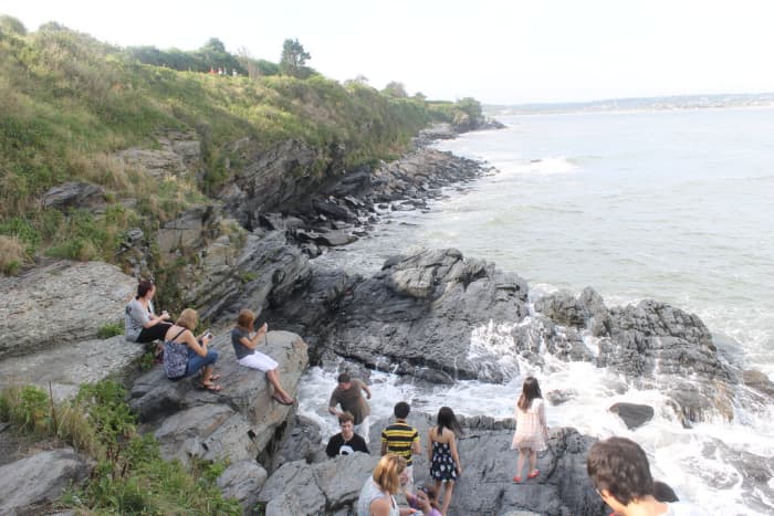 You can climb the rocks, but be careful. If you injure yourself, is will be difficult for crews to rescue you because many potential exits are locked. This is all private property.