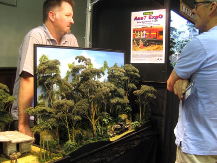 An example of a connected diorama, from outback to rainforest with rail. The level of detail on the foliage is outstanding!