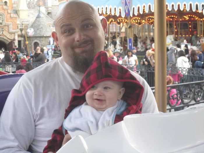 There is a Dumbo you can sit in outside the ride! Here is Daddy and Baby having some fun in a stationary Dumbo!