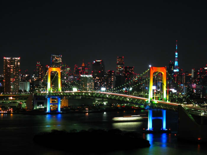 Displaying its namesake, rainbow bridge is illuminated at night using red, green and white lamps, powered by solar energy obtained each day.