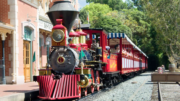 The Disneyland Railroad, featuring 5 of the world's only remaining steam powered locomotives, takes guests on scenic route around the entire park and ending with a trip through the Prehistoric Grand Canyon (featuring animatronic dinosaurs).