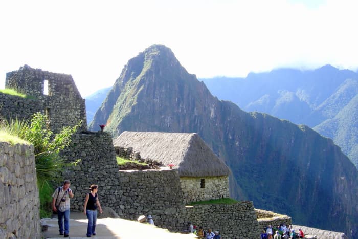 A reconstructed building at Machu Picchu sports a traditional thatched roof, such as it would have about the year 1500.