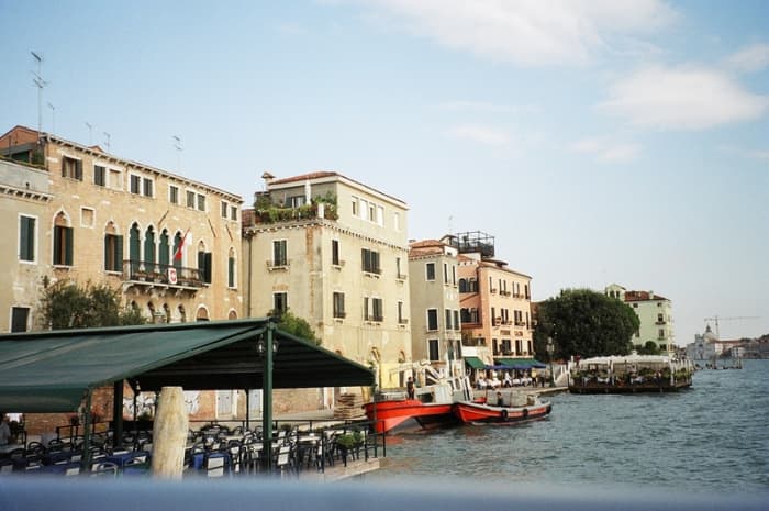 Boats, hotels and empty restaurants line the Grand Canal, prepared for the rush of the evening meal.