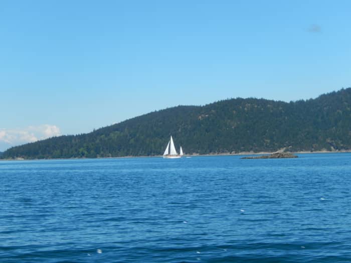 Elegant sailing vessels ply the waters of Rosario Strait, but if you're in your own power boat, remember sailboats have the right of way.