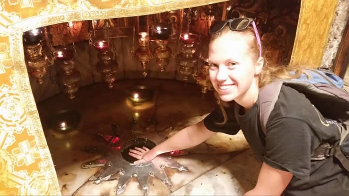 It is claimed that the rock I am touching is in the cave where Jesus was born. I don't know if it's true, but it was still very cool. This is located in Bethlehem.