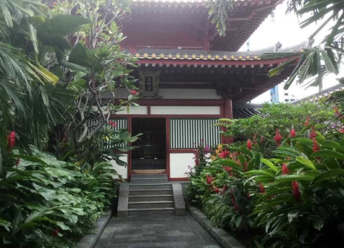The rooftop garden. A place of calm and respite which houses many rare plants. The pagoda houses the Buddha Tooth Relic Temple Prayer Wheel.