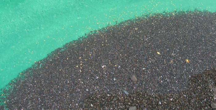 Black iron with gold flakes