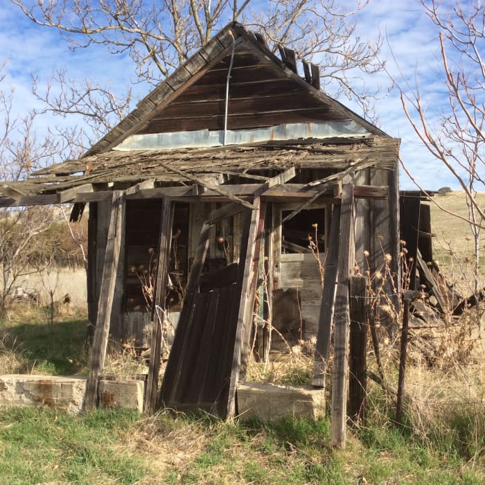 Wooden buildings and shacks exist in a state of arrested decay and add to the ghost town aura of Hornitos. If spirits remain, this house seems to be available for occupancy.