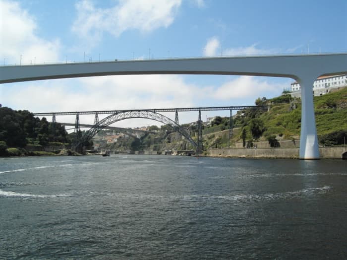 A view down river with Ponte de San Joao in the foreground and Ponte de Dom Maria Pia, followed by Ponte de Infante behind it.