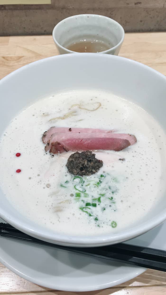 A new type of ramen: Fish and chicken bone broth ramen covered with a froth that is supposed to make soup coat the noodles well. Served with cold cuts and a truffle sauce