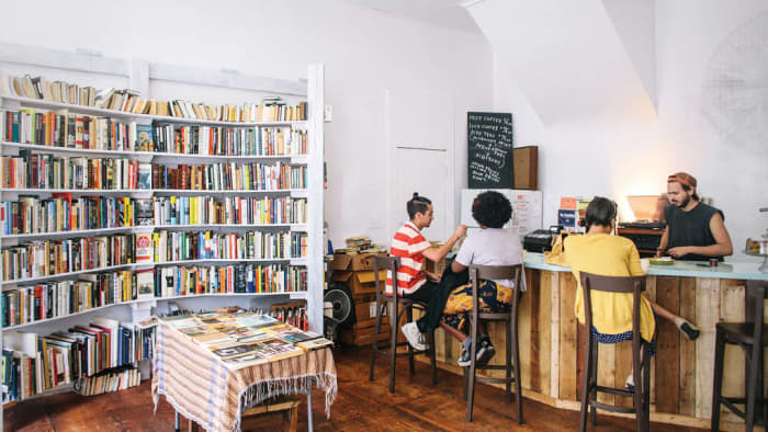 Located in Central Brooklyn, you can stop into Molasses Books to browse for a good read and sip your drink of choice