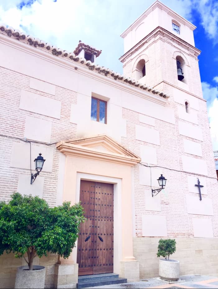 The Church Nuestra Señora del Carmen with its swallows nests along the roof.
