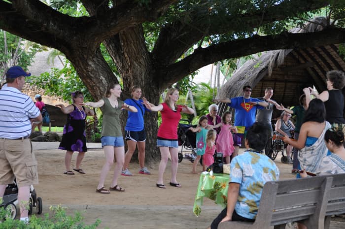 Guests participate in complimentary hula lessons at the Polynesian Cultural Center