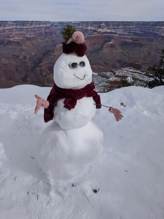 Snowman built by someone else earlier but dressed by my wife